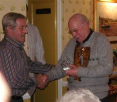 Pat Hughes wins the Memorial Trophy with his burr vase